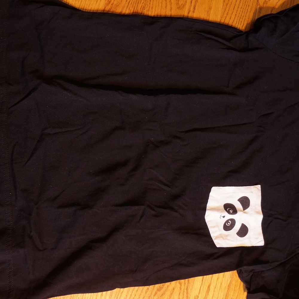 black t-shirt with panda pocket detail